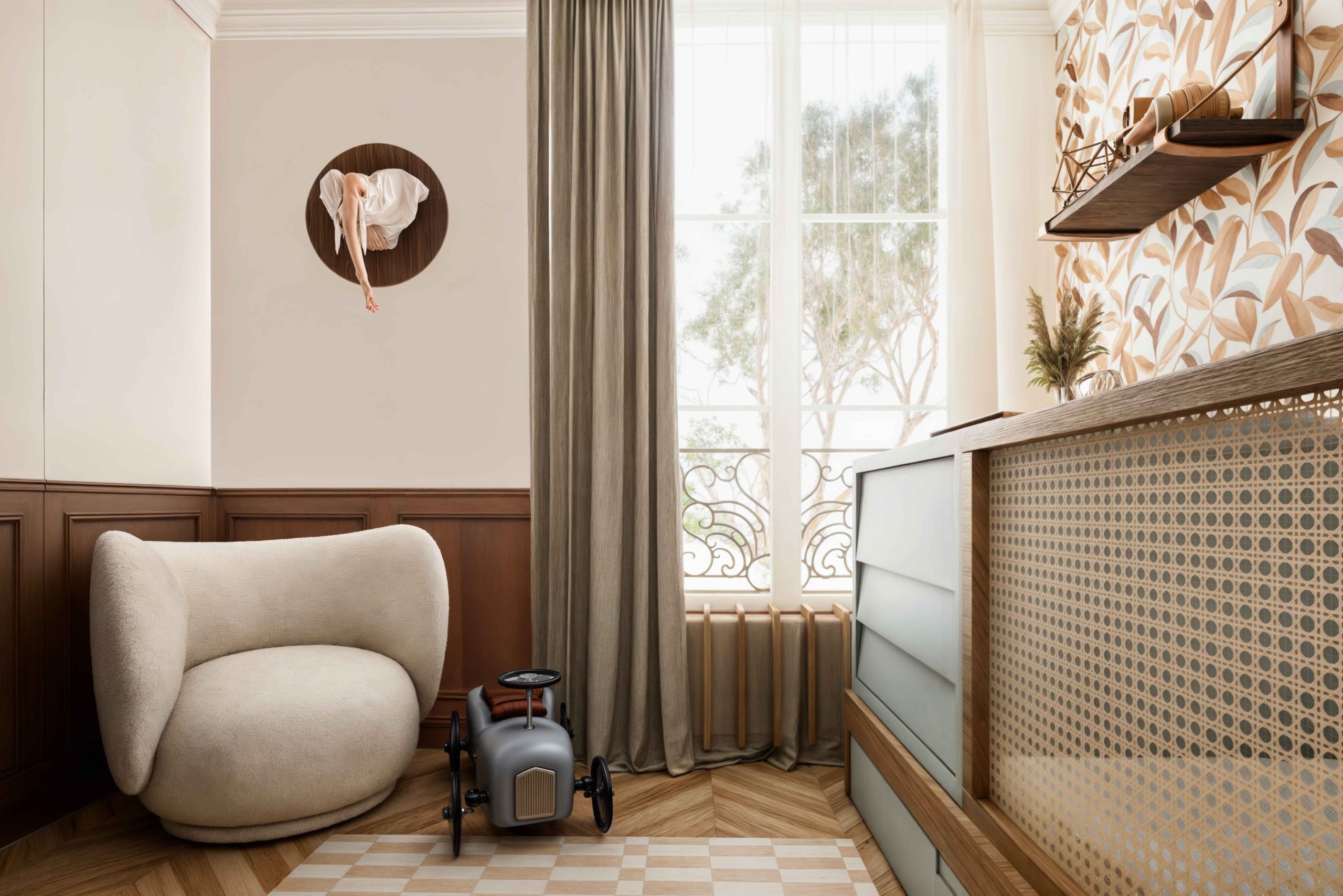 Coin lecture dans une chambre d’enfant d’un appartement haussmannien rénové à Paris
