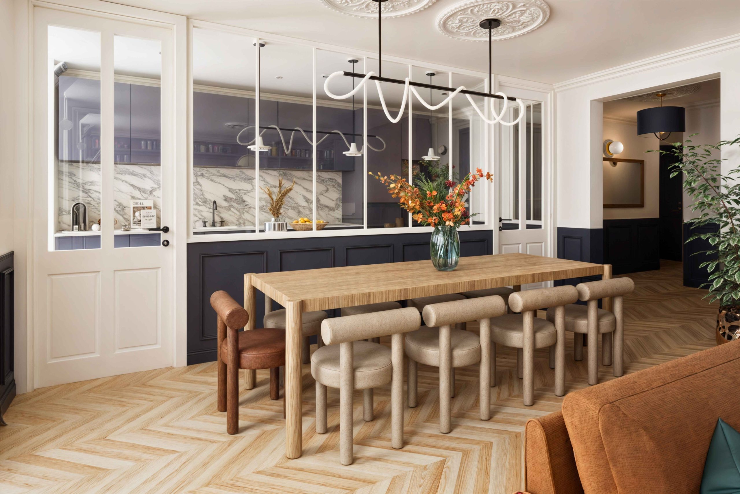 Salle à manger ouverte sur salon dans un appartement familial parisien