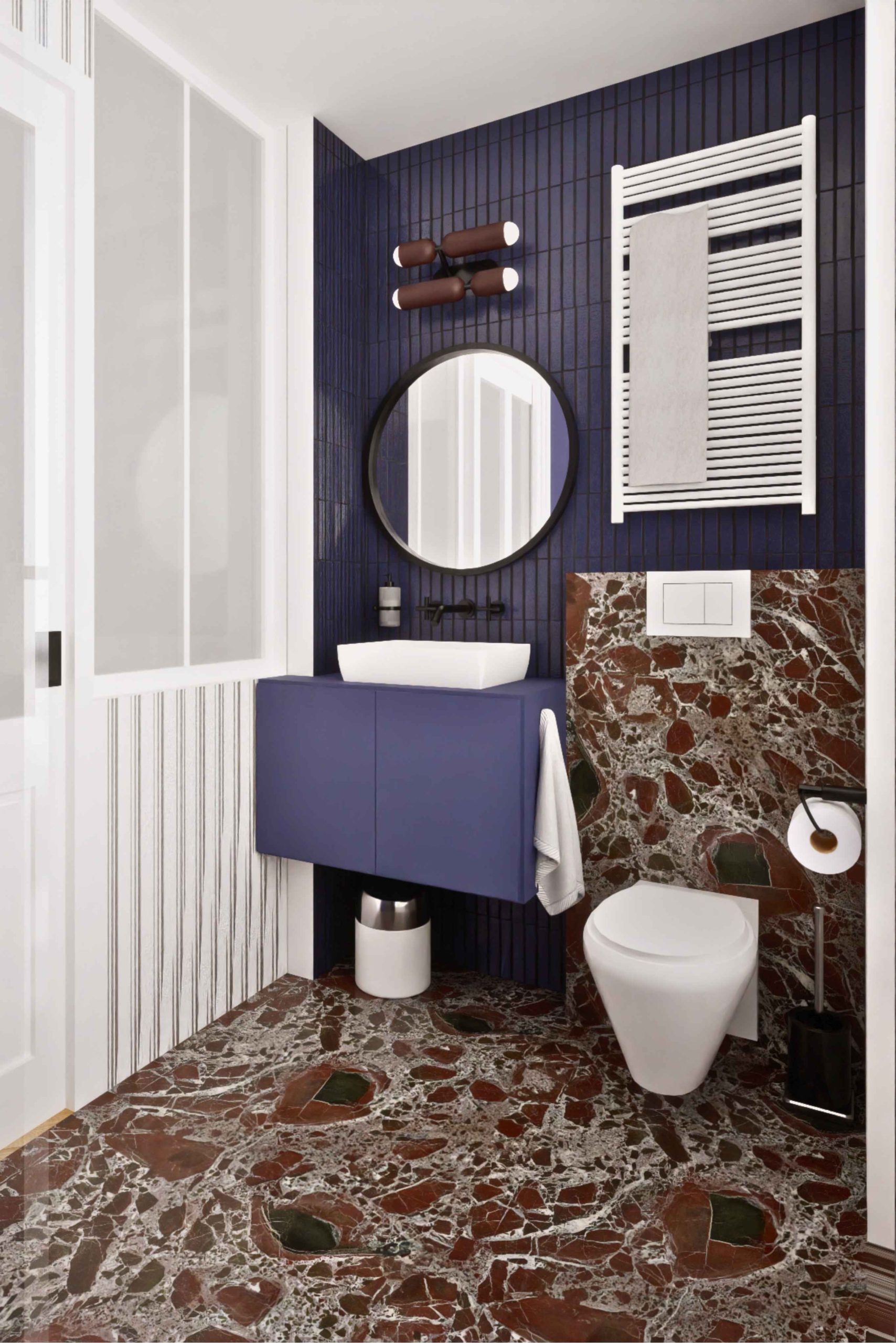 WC avec meuble vasque bleu et sol en marbre terrazzo dans un appartement parisien rénové